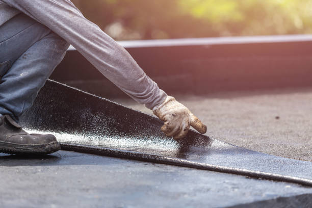 Professional Basement Waterproofing technician working in New Richmond, OH